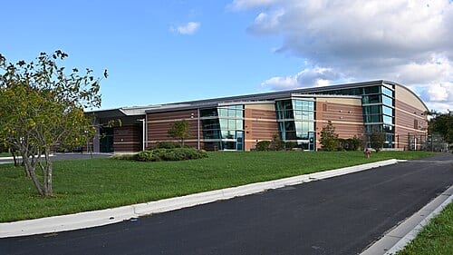 The side of the Damascus Community Recreation Center showing its high, arched roof. Part of Montgomery County Recreation. 25520 Oak Drive, Damascus, Maryland 20872.