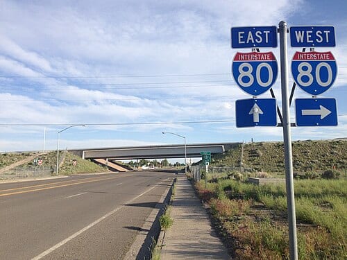 Signs for Interstate 80 at the west end of Nevada State Route 223 (Humboldt Avenue) in Wells, Nevada
