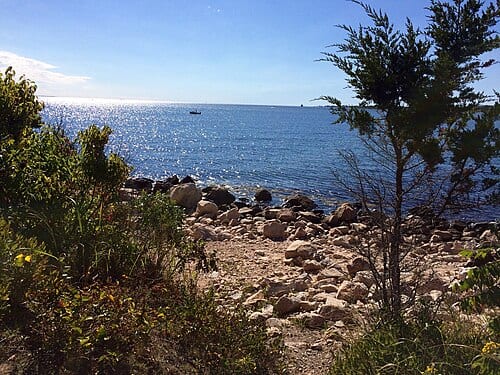 Bluff Point view of Long Island Sound with Fisher's Island (left) and the New London Ledge Lighthouse (right) visible on the horizon.
