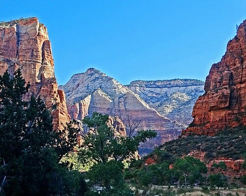 (1 in a multiple picture album) If you go to Zion, and have the time, get off the public walks and onto a trail. Then you will see the REAL park. This is especially true at sunrise or sunset. That is Angel's Landing on the left.