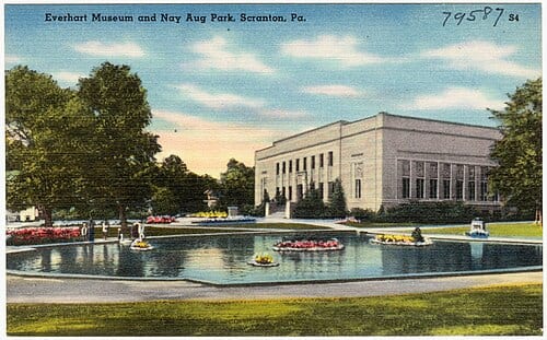 Title: Everhart Museum and Nay Aug Park, Scranton, Pa. Subjects: Galleries & museums; Parks Places: Pennsylvania > Lackawanna (county) > Scranton Notes: Title from item. Extent: 1 print (postcard) : linen texture, color ; 3 1/2 x 5 1/2 in. Accession #: 06_10_018265