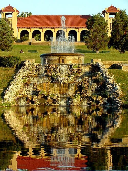 Government Hill in Forest Park in St. Louis, Missouri as it once appeared, with the World's Fair Pavilion at the top of the hill. The hill has changed and the fountain replaced with a different fountain since this picture was taken. Forest Park, St. Louis