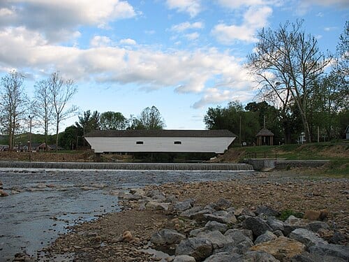 Historic Elizabethton, Tennessee covered bridge, built in 1882, stretches 134 feet across the Doe River .