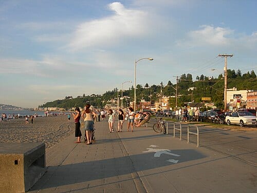 Promenade and beach, Alki Beach, Seattle Washington (looking northeast). Note the top of the Space Needle in the extreme background, over the hill.