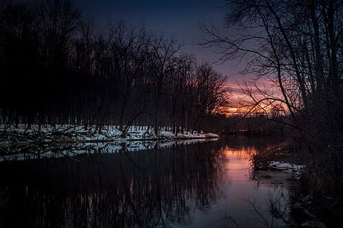 Late sunset from along the north bank of the Tittabawassee river near the Averill Rollway. The Averill Rollway was a log banking ground from 1876 until 1887 during the lumber boom. At one point Averill was the largest such banking ground in the world with 21.5 million board feet of lumber stored…