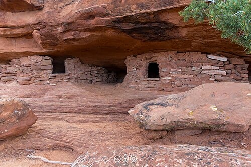 These structures are around 1000 years old and were used as granaries (a flat stone covered the entrance).