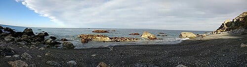 Starlight Beach in all its glory. A front forms a straight line in the clouds above. IMG_20161226_145741711