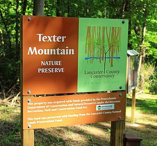 Parking-area sign at the Texter Mountain Nature Preserve, Lancaster County. Owned and managed by the Lancaster County Conservancy, the preserve protects 200-plus acres of Appalachian Highlands mixed hardwood forest. A blue-blazed trail traverses the property. Occupying the rugged, remote northern…